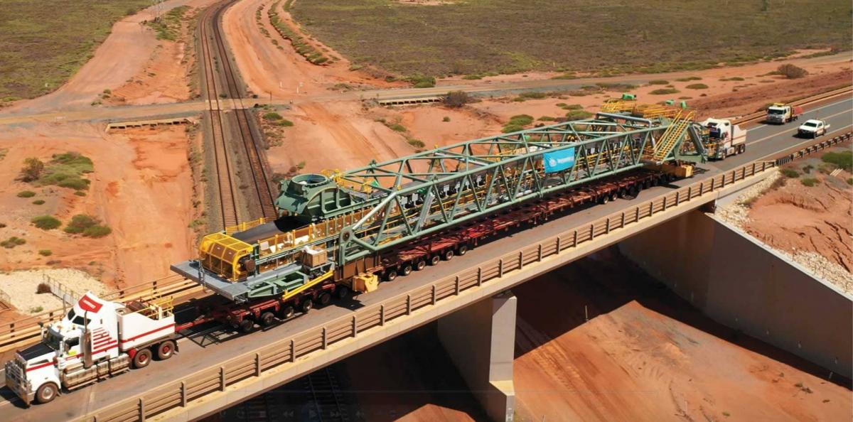 Aerial view of large truck carrying module in the Pilbara