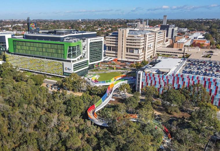 An aerial view of a brightly coloured bridge going from the Perth Children's Hospital to Kings Park