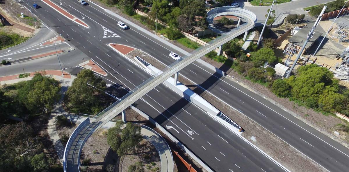 Aerial view of pedestrian bridge over road