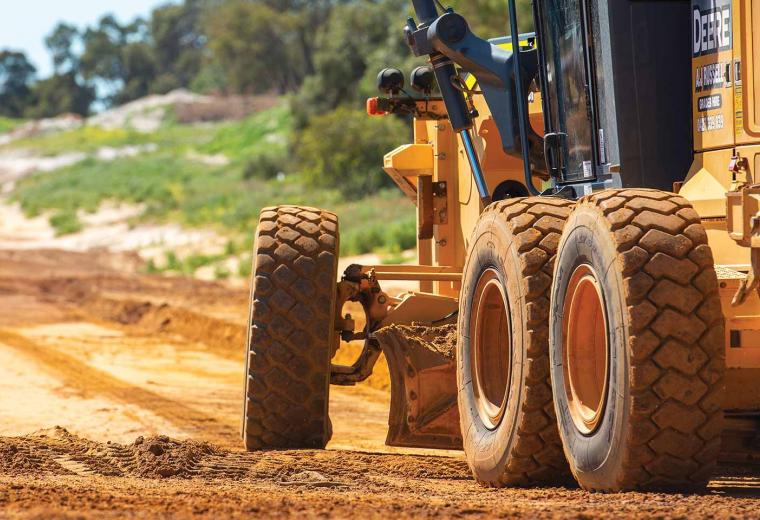 Bulldozer working on a dirt road