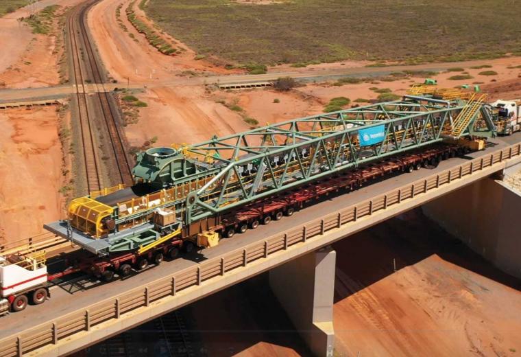 Aerial view of large truck carrying module in the Pilbara