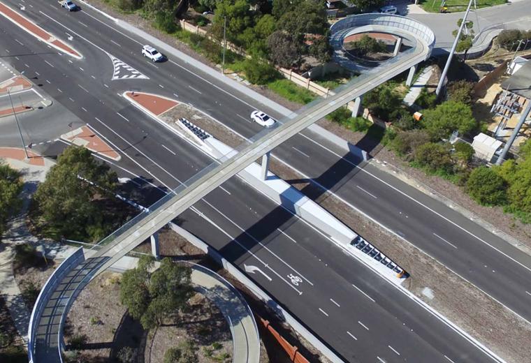 Aerial view of pedestrian bridge over road