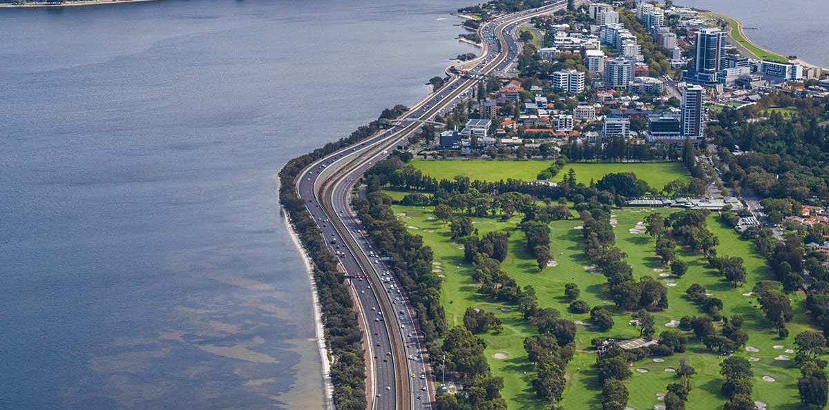 Aerial view of the Kwinana Freeway with the Swan River to the left